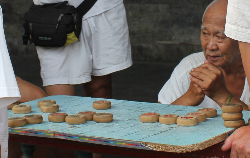 Locals playing Mahjong