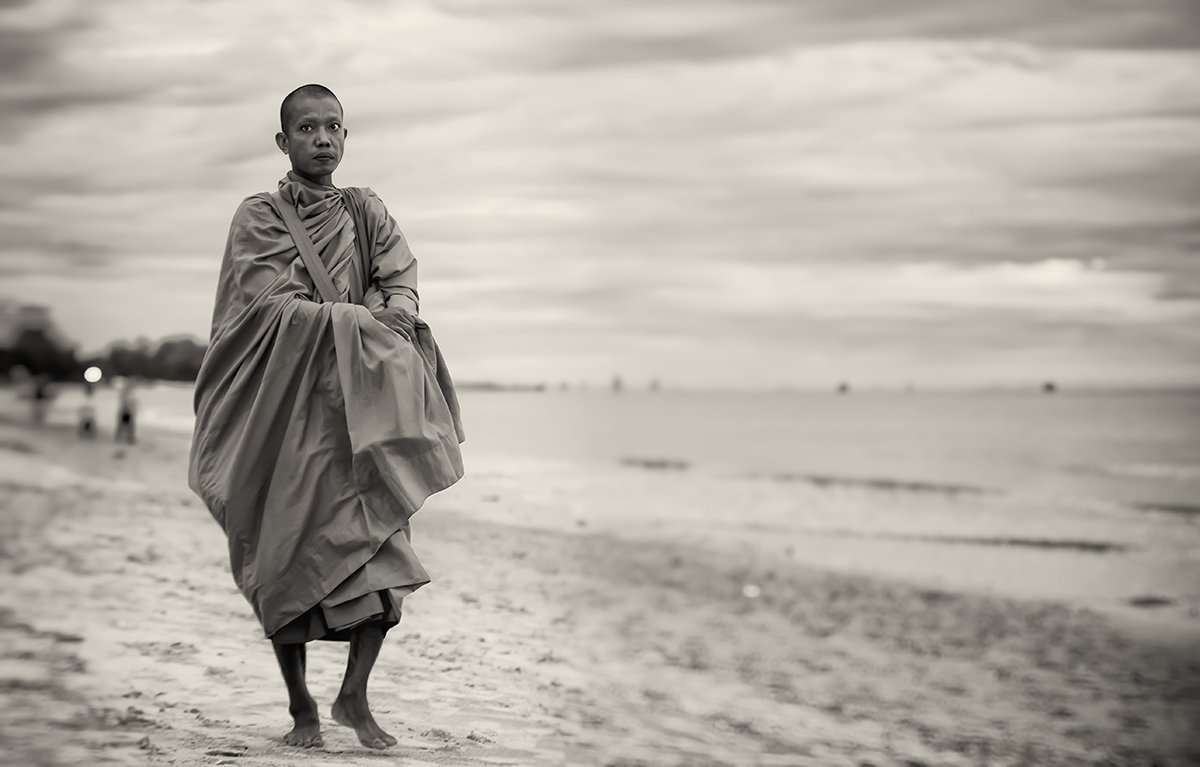 Morning alms on the beach, travel photography